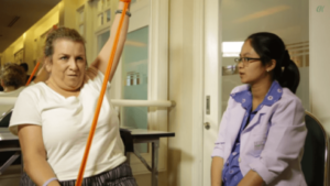 Mia Ruthey exercising during therapies for her PLS